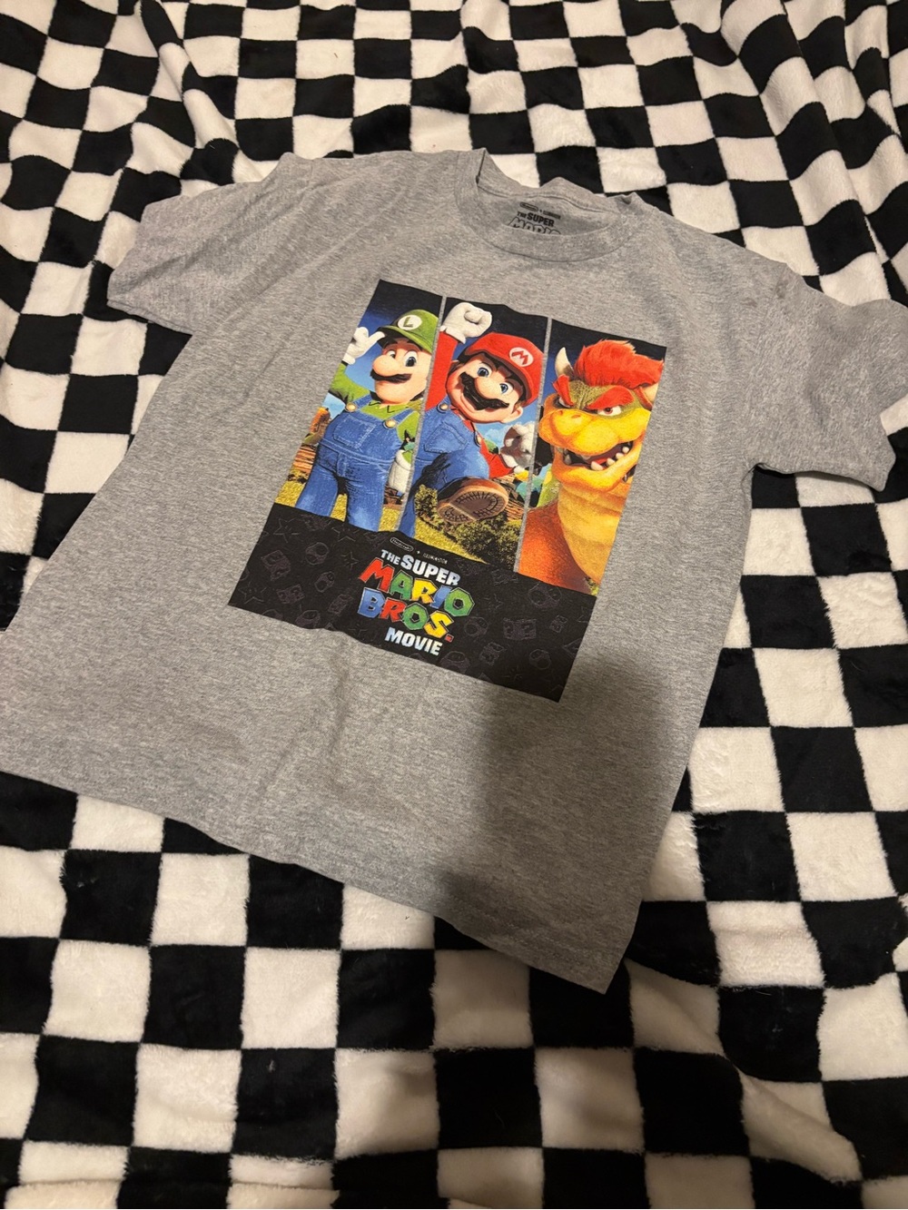 Boys medium mario shirt (stain on sleeve)